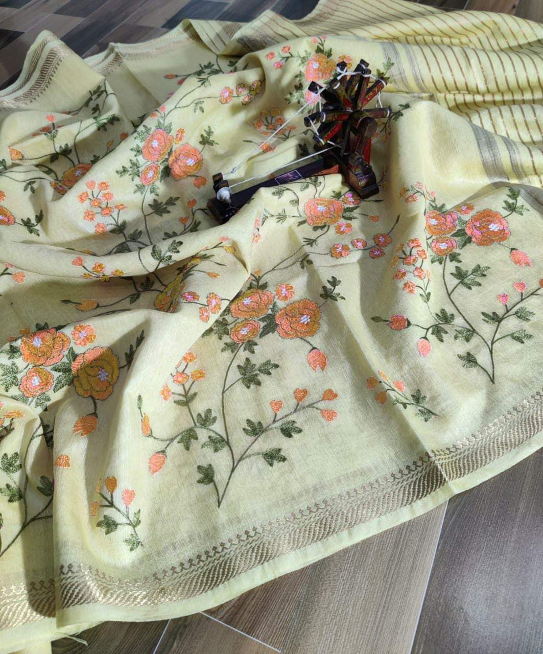 Pastel yellow pure silk linen embroidered sarees