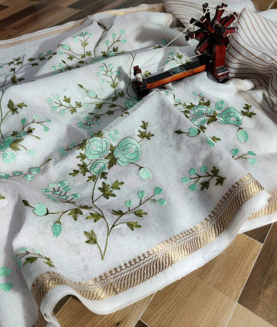 Off white pure silk linen embroidered sarees