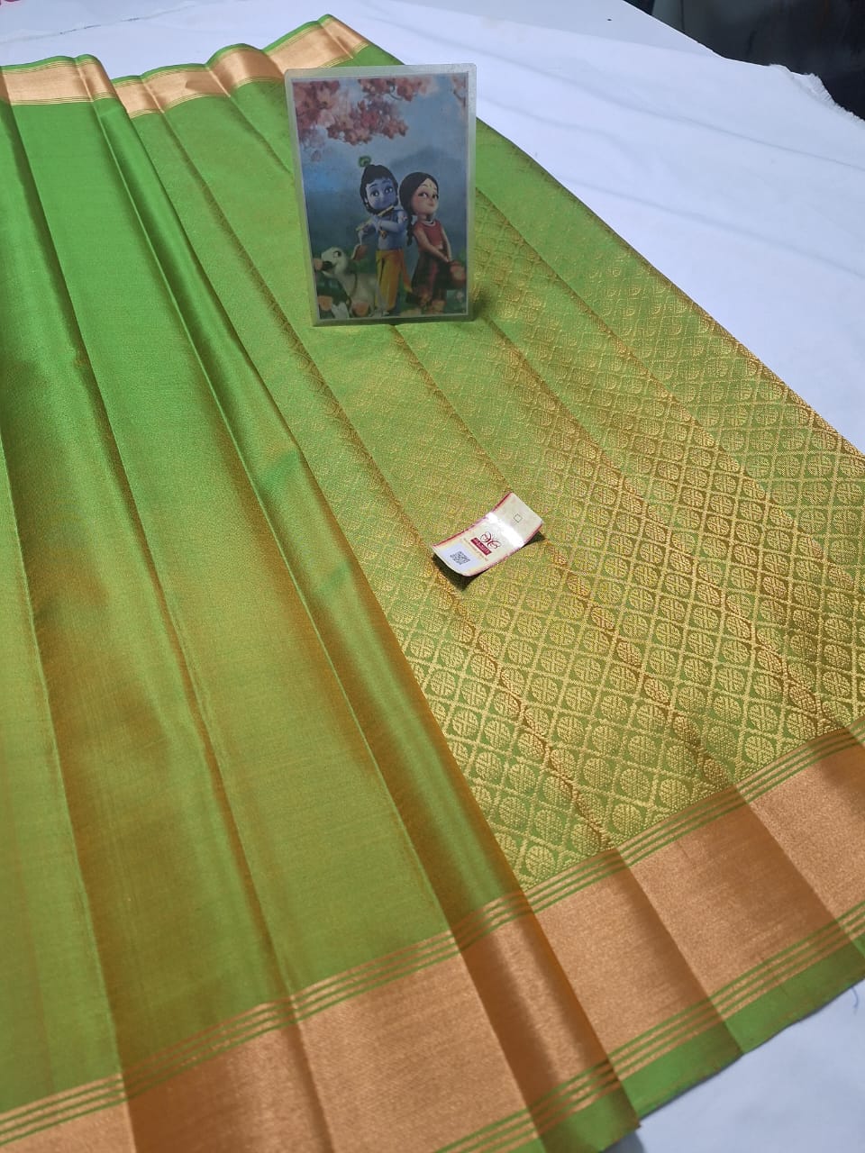 green Pure kanchipuram plain silk sarees