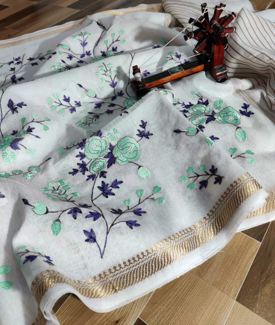 White pure silk linen embroidered sarees