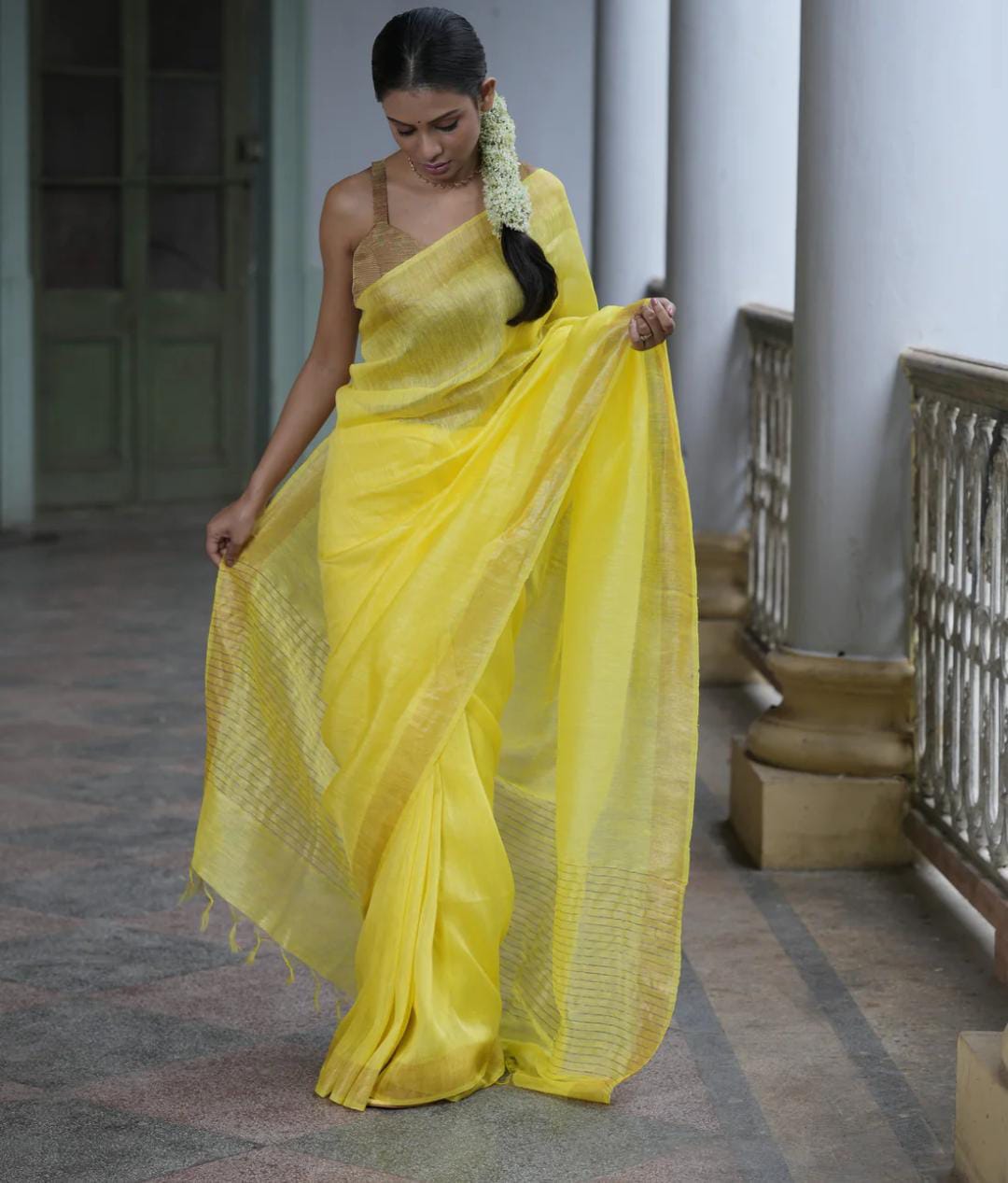 Yellow festive wear silk linen sarees