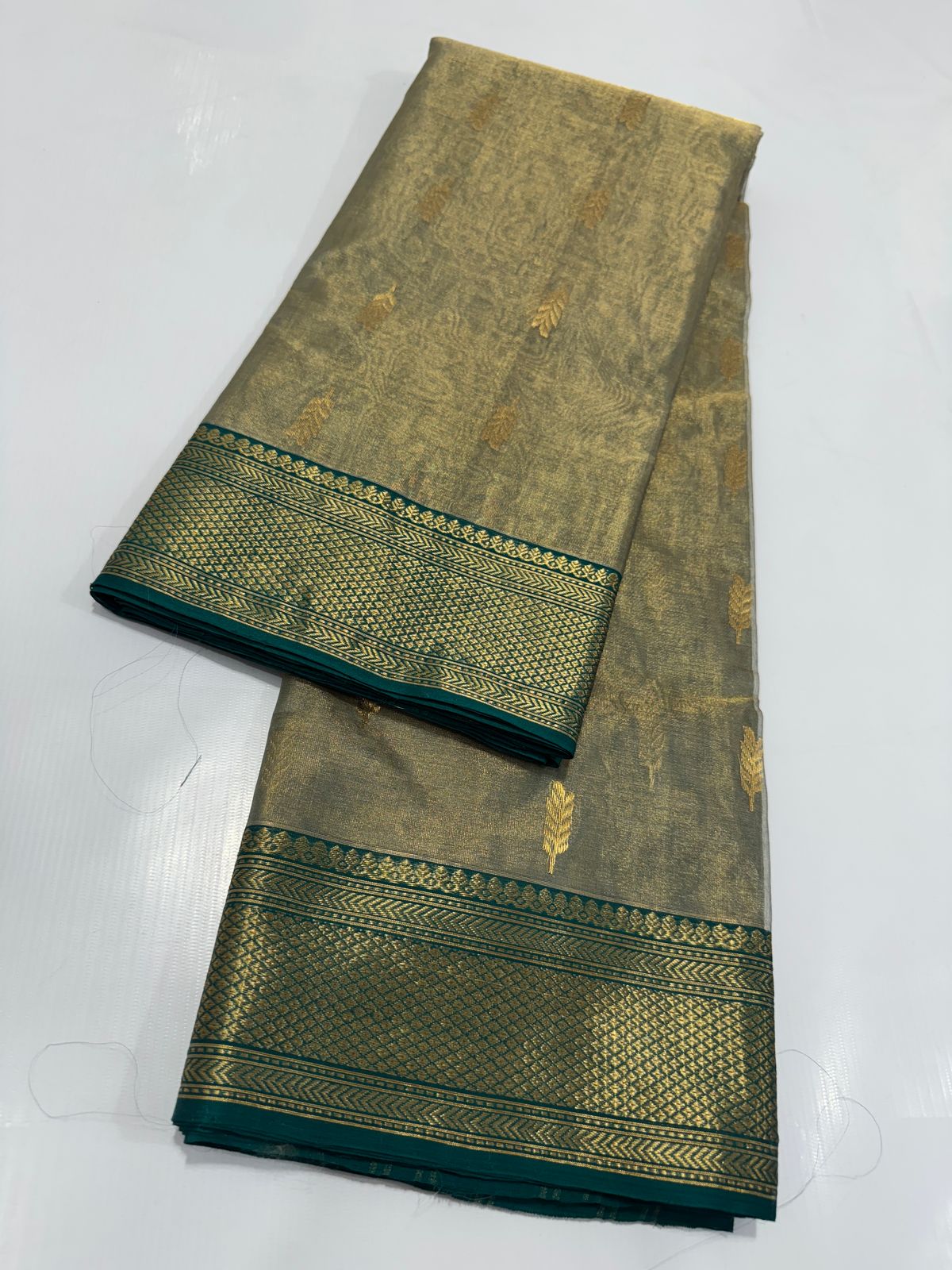 Dark green chanderi tissue silk sarees
