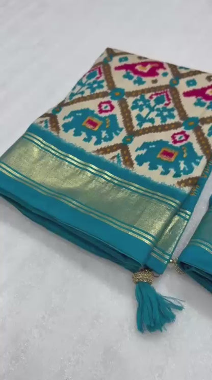 Sky blue munga crepe patola silk sarees