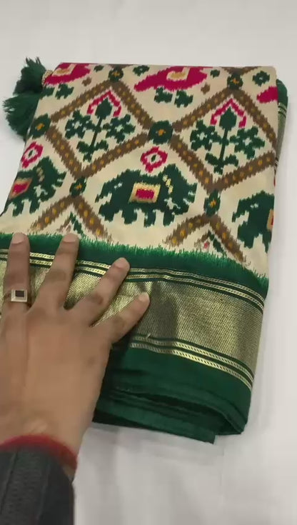 Bottle green munga crepe patola silk sarees