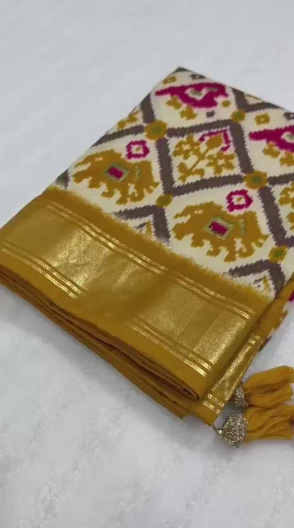 Mustard yellow munga crepe patola silk sarees