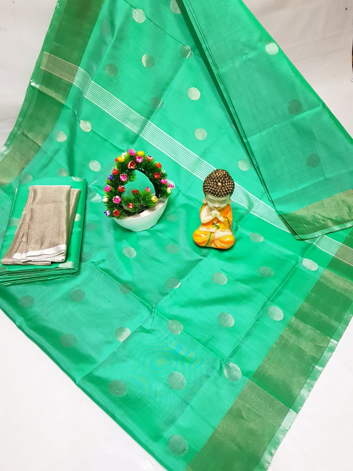 Uppada silk dollar butta sarees