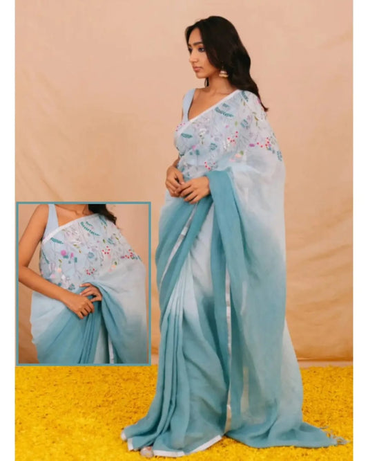 Cream with blue linen embroidery sarees
