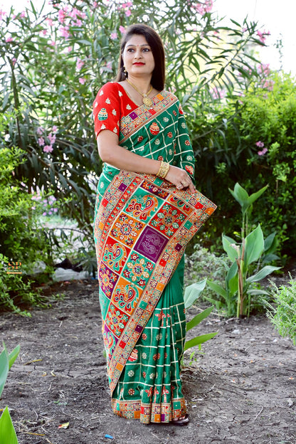 Dark green Vichitra silk patola sarees