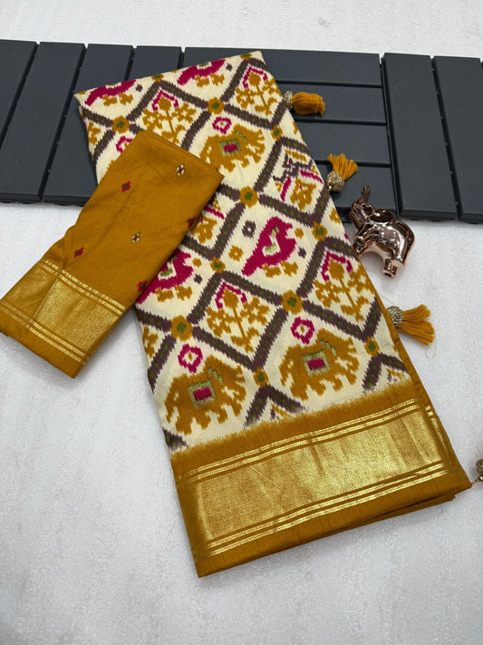 Mustard yellow munga crepe patola silk sarees