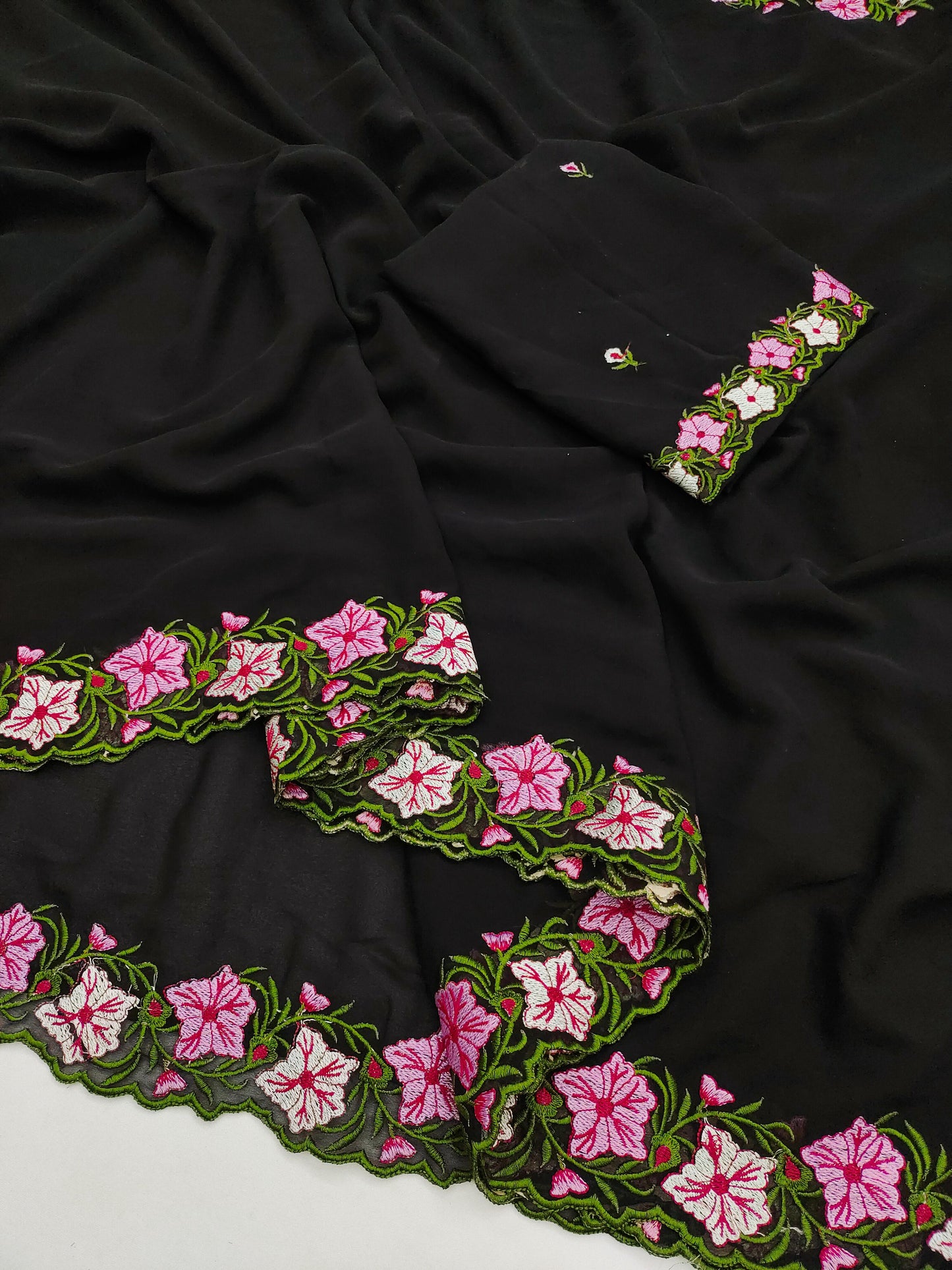 Pastel color faux georgette embroidery sarees