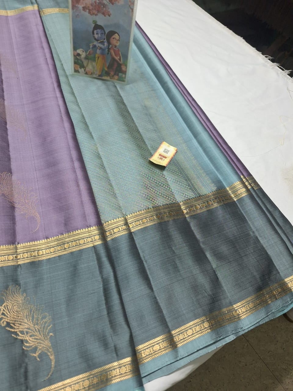Pure kanchipuram soft silk with peacock feather butta