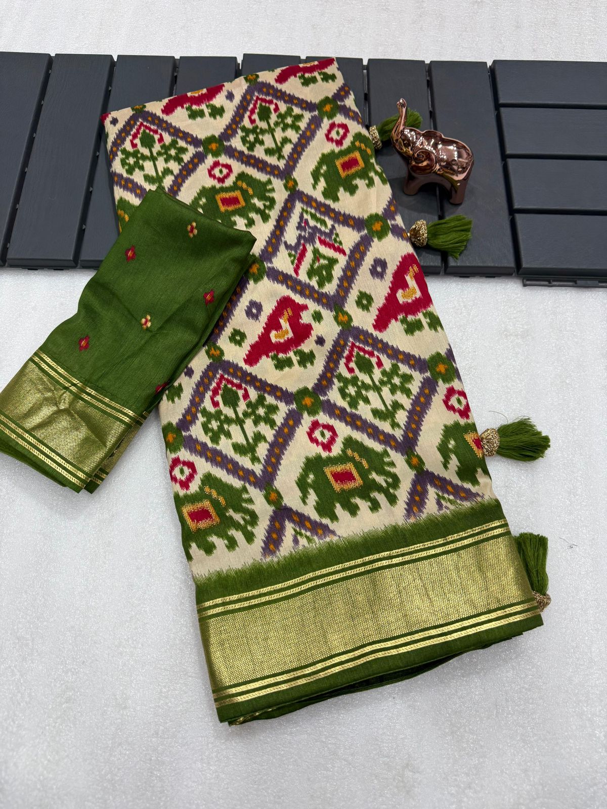 Olive green munga crepe patola silk sarees