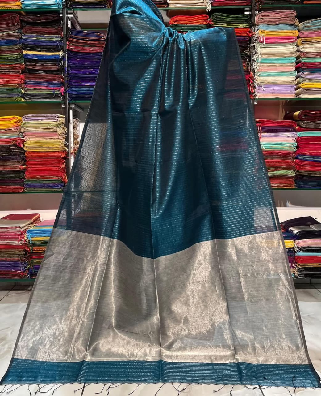 Dark peacock green semi silk striped sarees