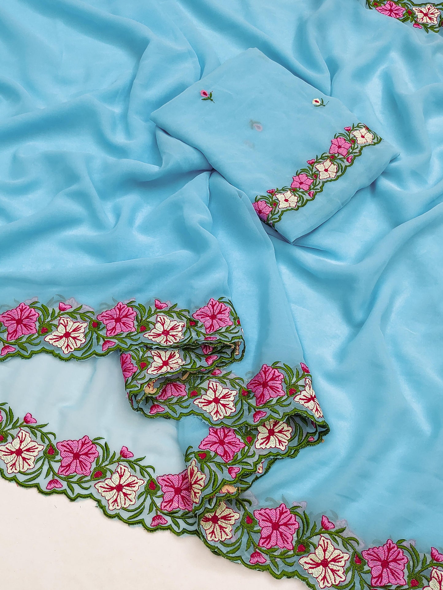Pastel color faux georgette embroidery sarees