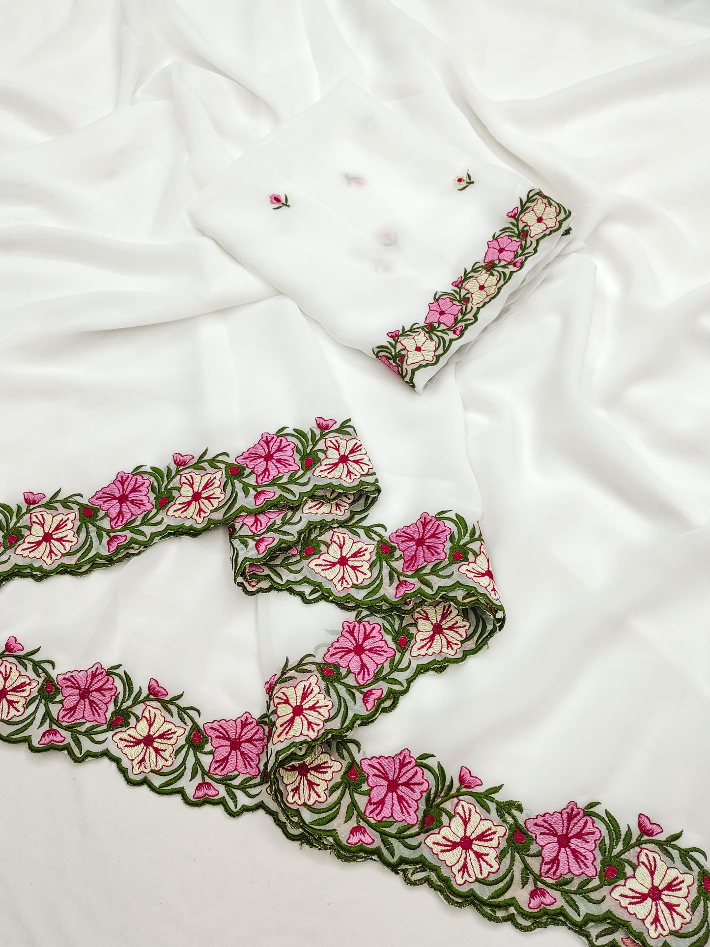 Pastel color faux georgette embroidery sarees