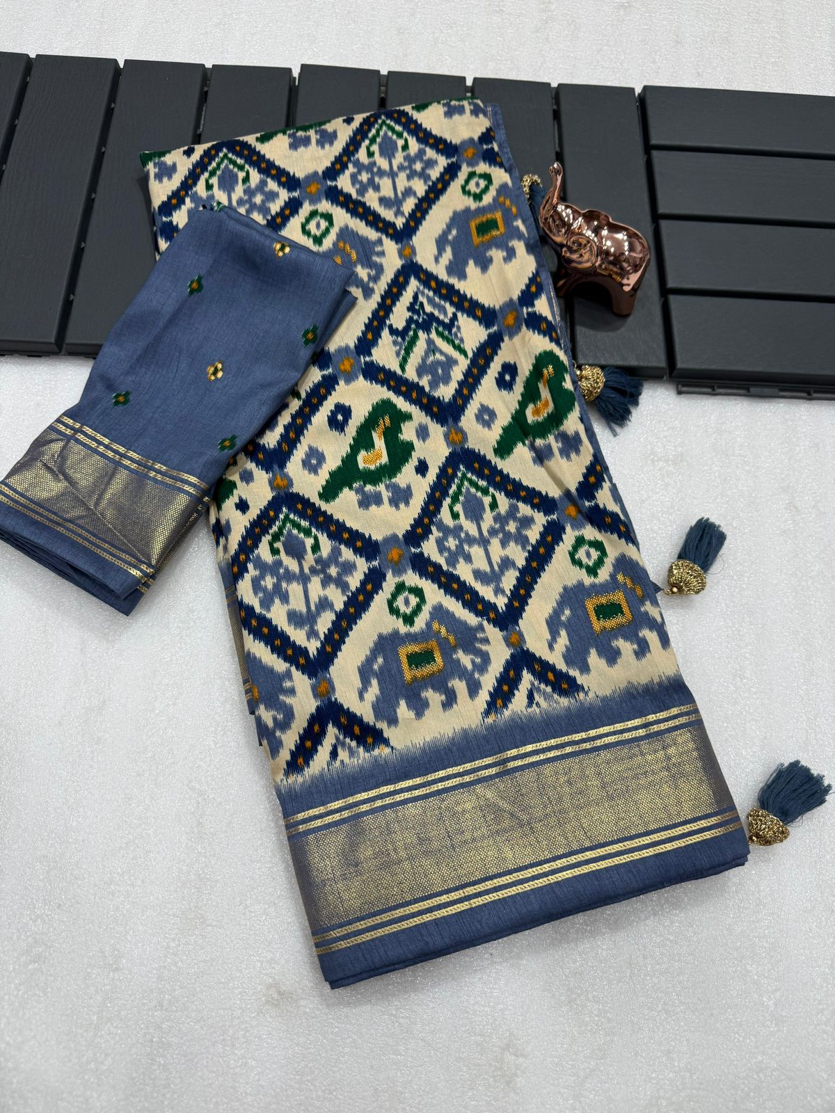 Bluish gray munga crepe patola silk sarees