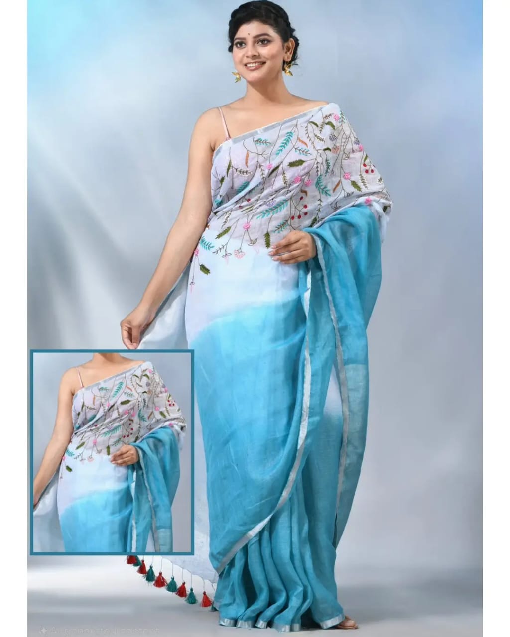 Cream with sky blue linen embroidery sarees