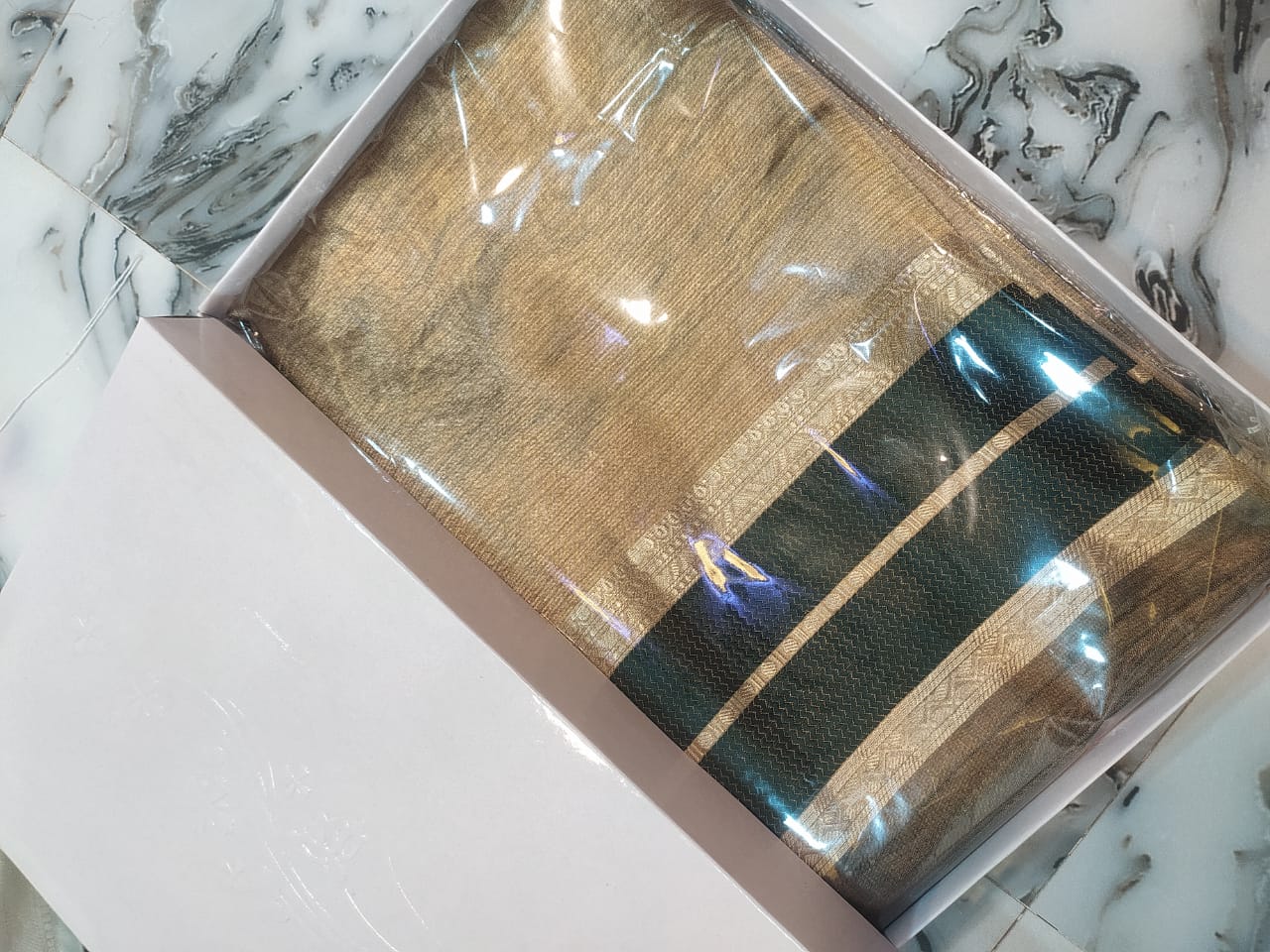 Gold with dark green pure metallic double tissue organza sarees