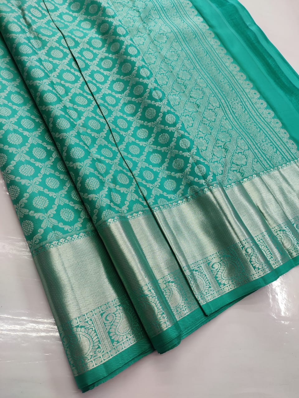 Teal green pure handloom silk sarees