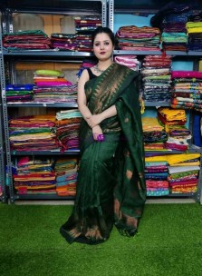 Dark green linen by linen copper zari jamdani sarees