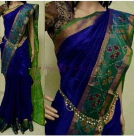 Dark blue uppada sarees with small pochampally border