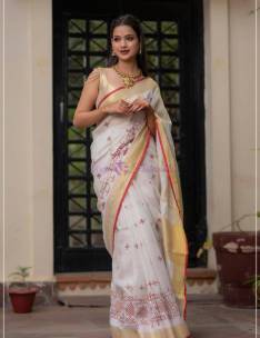 Onam special linen sarees with beautiful embroidery design